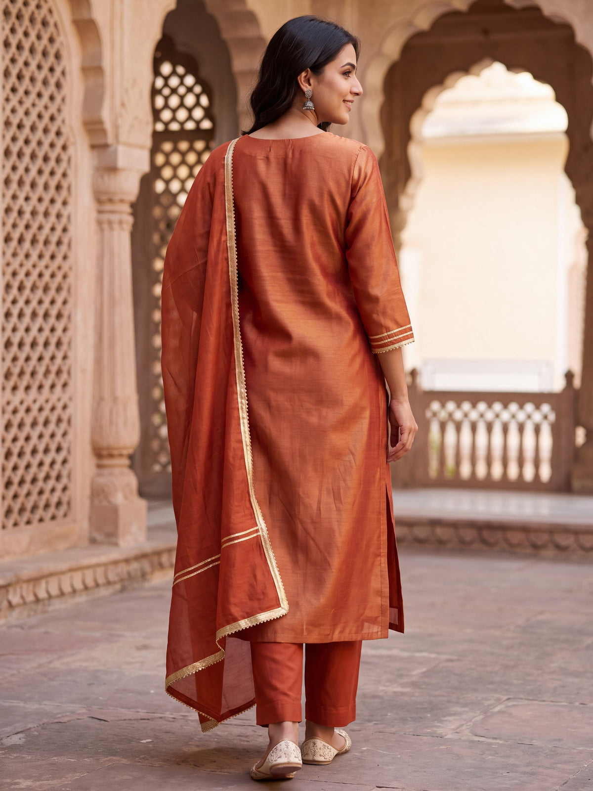 Noor rust tissue-silk kurta set, back view